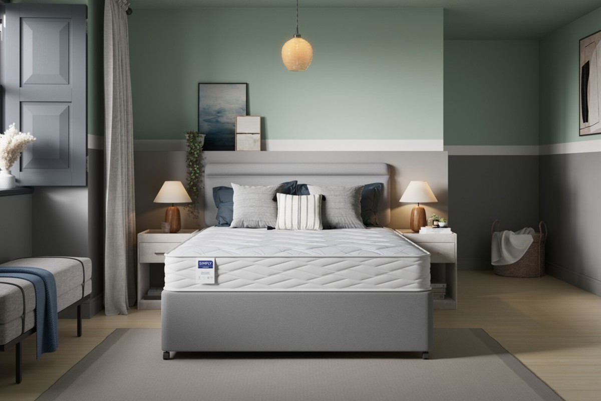 A Simply by Bensons budget-friendly mattress on a budget-friendly divan base set in a calm bedroom design