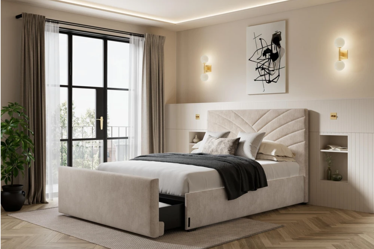 A Beige, velvet bedframe in a modern bedroom
