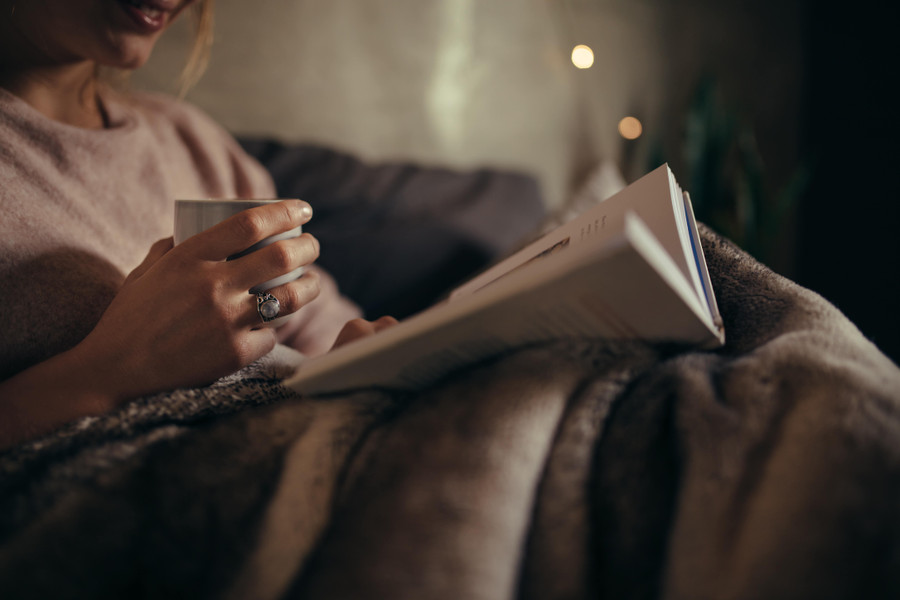 Reading in Bed: the Benefits, Pillows, and Books