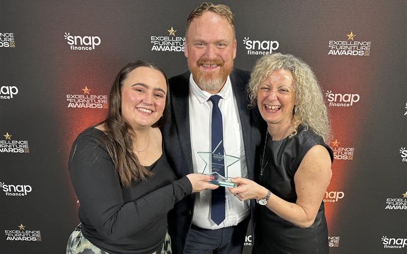 Megan Thompson (Junior Buyer), Steve Adlington (Head of Services) & Emma Beck (Mattress and Softs Buyer) receiving the Furniture Retailer of the Year award.